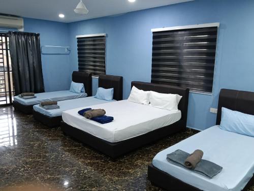 Ein Bett oder Betten in einem Zimmer der Unterkunft JSW PRAMLee Georgetown Penang