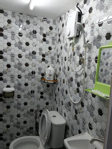 Ein Badezimmer in der Unterkunft JSW PRAMLee Georgetown Penang