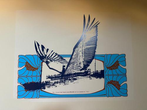 a drawing of a ship with a bird at Hostel Vertigo Vieux-Port in Marseille