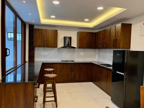 Kuchyň nebo kuchyňský kout v ubytování Kandy Breeze City Hotel