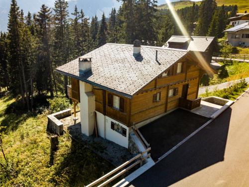 an overhead view of a house with a roof at Chalet Soldanella by Arosa Holiday in Arosa