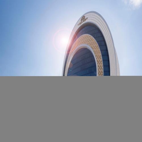 a view of the headquarters of the european parliament at Velero Hotel Doha Lusail in Doha
