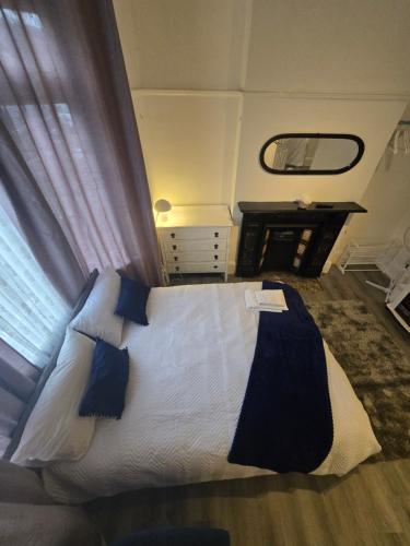 The Point Houseにあるベッド