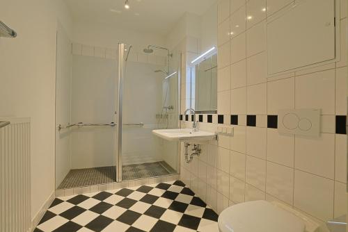 Ванная комната в Ferienwohnung im Grand Living
