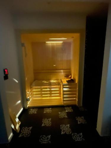 an empty refrigerator with its door open in a room at Panta Rei Camere di Charme e Spa in Taranto