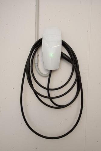 a computer mouse sitting on top of a black cord at "Vue Du Clocher" - Etroubles Boutique Apartment in Etroubles