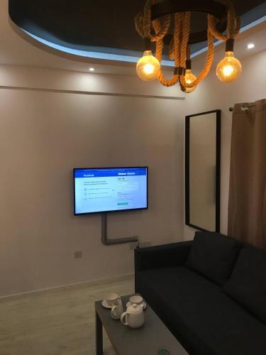 TV a/nebo společenská místnost v ubytování Papadavid Apartments