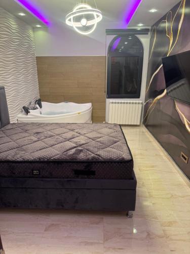 Postel nebo postele na pokoji v ubytování Apartman Andrej