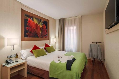 Postel nebo postele na pokoji v ubytování Hotel Condes de Haro