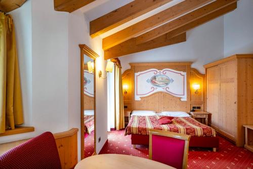 Posteľ alebo postele v izbe v ubytovaní Hotel Al Polo