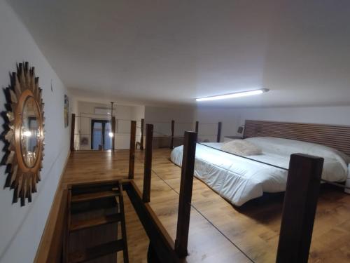 a bedroom with a large bed in a room at La dimora di Alice in Sassari