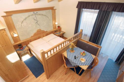 מיטה או מיטות בחדר ב-Residence Priska