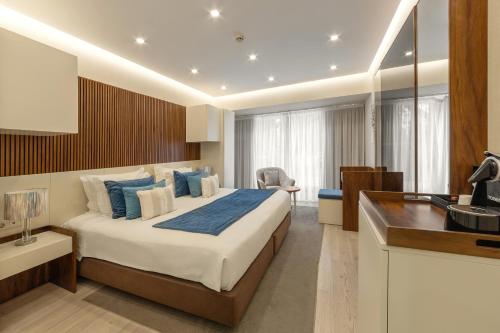 Una cama o camas en una habitación de Hotel Lido