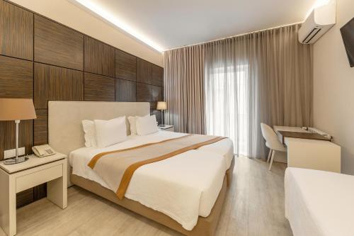 Una cama o camas en una habitación de Hotel Lido
