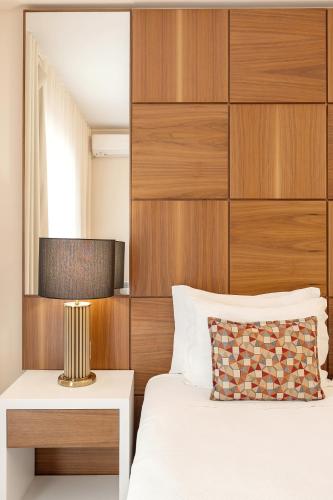 Una cama o camas en una habitación de Hotel Lido