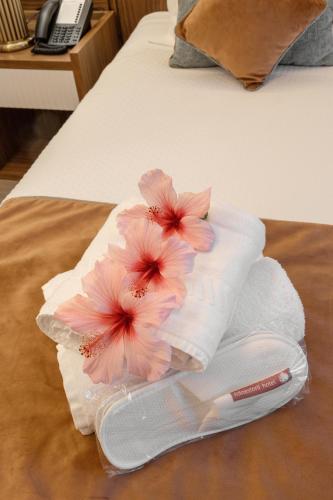 Una cama o camas en una habitación de Hotel Lido