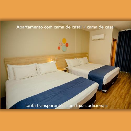 Postel nebo postele na pokoji v ubytování Luds Comfort Hotel