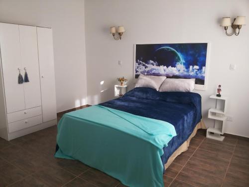 En eller flere senge i et værelse på CABAÑAS DEL ANGEL