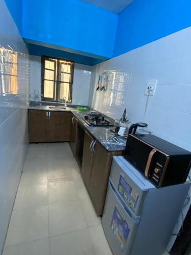 Una cocina o cocineta en De Royal Lodge