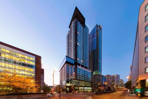 a group of tall buildings in a city at Hôtel AC Montréal Centre-ville in Montréal