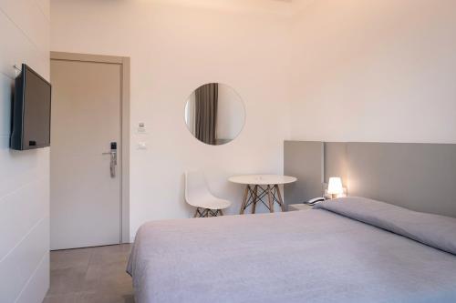 Perla Verde Hotelにあるベッド