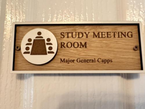 a sign for a subway meeting room in a bathroom at Forces Manor in Kincraig