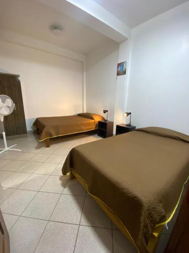 Ένα ή περισσότερα κρεβάτια σε δωμάτιο στο Refugio Rosita