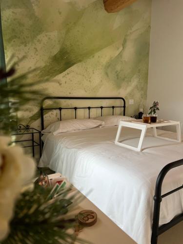 Una cama o camas en una habitación de Agriturismo Cascina Capo
