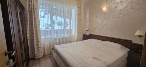 En eller flere senge i et værelse på Forest Dreams