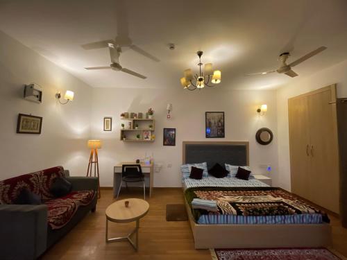 Postel nebo postele na pokoji v ubytování Dream Vibes Studio Apartment