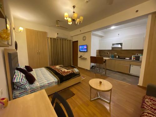 Kuchyň nebo kuchyňský kout v ubytování Dream Vibes Studio Apartment