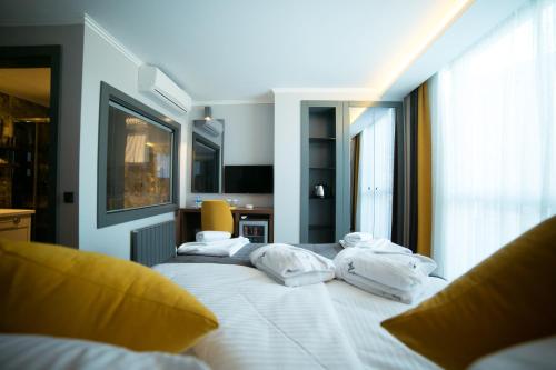 Una cama o camas en una habitación de Ankacity Suit Flat