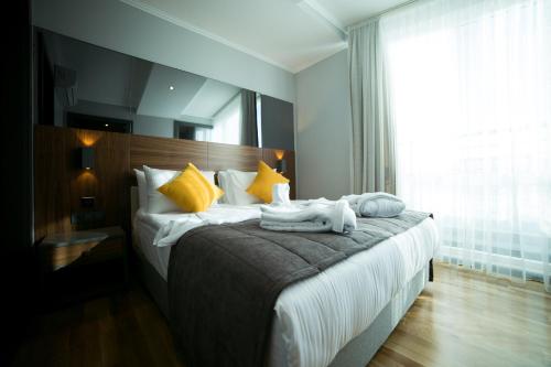 Una cama o camas en una habitación de Ankacity Suit Flat