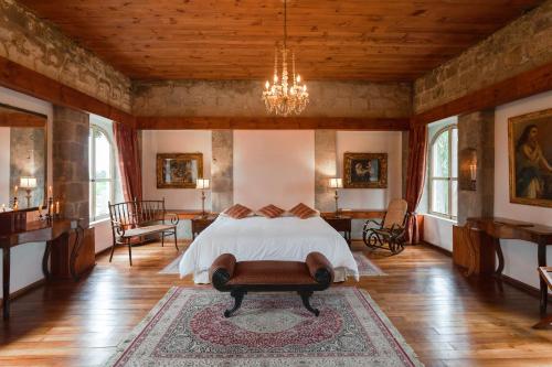 Postel nebo postele na pokoji v ubytování Hacienda La Cienega