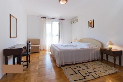 Postel nebo postele na pokoji v ubytování Apartment Parenzana