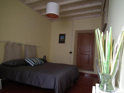 Un pat sau paturi într-o cameră la L'Attichetto di Zagarolo