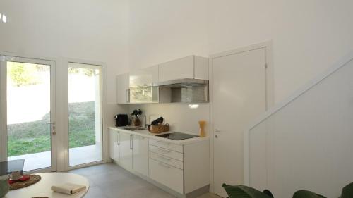 Kuchyň nebo kuchyňský kout v ubytování Casa Raggia