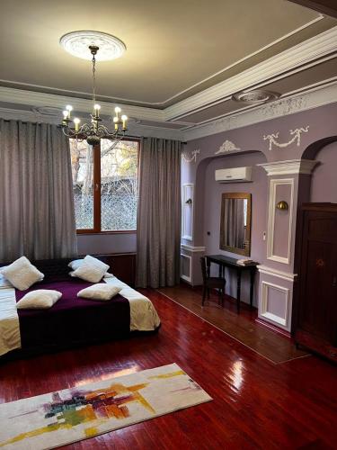 Una cama o camas en una habitación de MICHELE Hotel