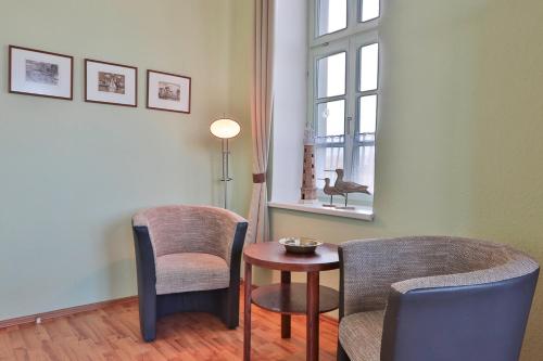 Posezení v ubytování Herrenhaus Blengow App. 05 Salzbinse