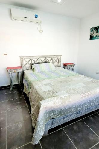 a bedroom with a large bed in a room at LaChula Casa con Piscina in Federación