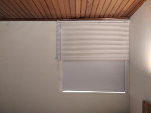 Fotografie z fotogalerie ubytování Cuarto Cama King Smart TV en apartamento atico Tunja v destinaci Tunja
