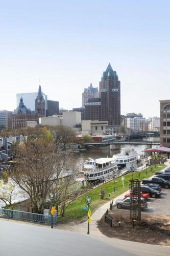 a view of a city with boats in a parking lot at aloft Hotel Milwaukee Downtown in Milwaukee