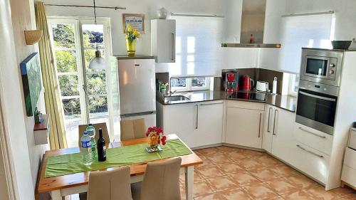 Η κουζίνα ή μικρή κουζίνα στο Appartement Caldera