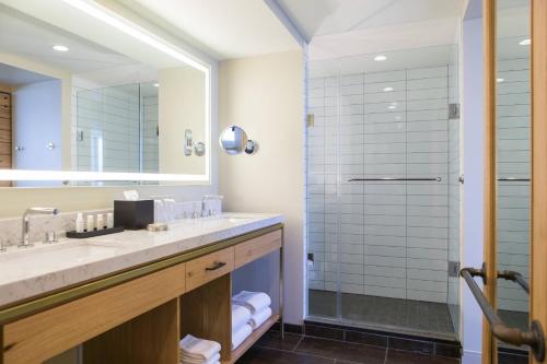 a bathroom with a large sink and a shower at Renaissance Allentown Hotel in Allentown
