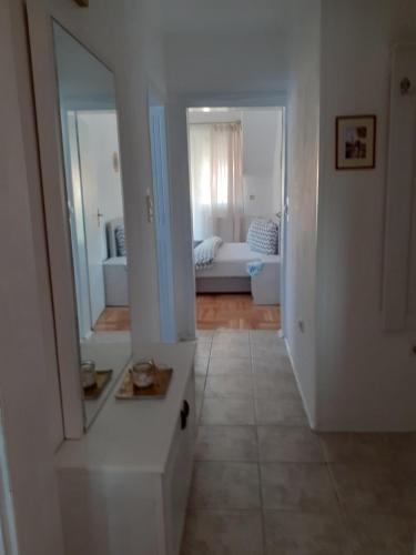 Ένα ή περισσότερα κρεβάτια σε δωμάτιο στο Komforni Apartmani Banja Luka