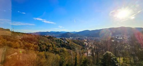 a view of a city from a hill at Hotel Artxanda Bilbao, Parking Gratuito en el Exterior Junto al Hotel in Bilbao