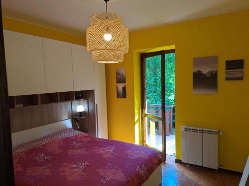 Ένα ή περισσότερα κρεβάτια σε δωμάτιο στο La casa di Toby