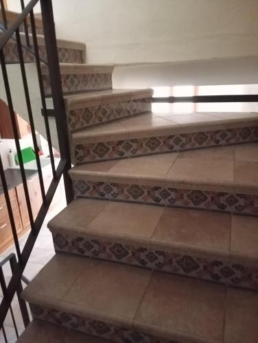 a set of stairs in a building at Ca la Mariana in Organyà