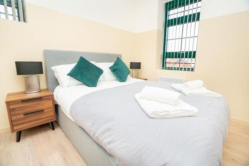 Ένα ή περισσότερα κρεβάτια σε δωμάτιο στο Stylish 1 Bed Apartment in Central Newark