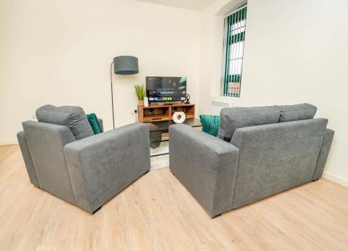 Μια τηλεόραση ή/και κέντρο ψυχαγωγίας στο Stylish 1 Bed Apartment in Central Newark